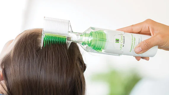 Applying the liquid gel to hair